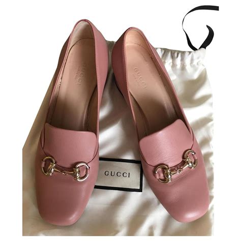 pink gucci heels.